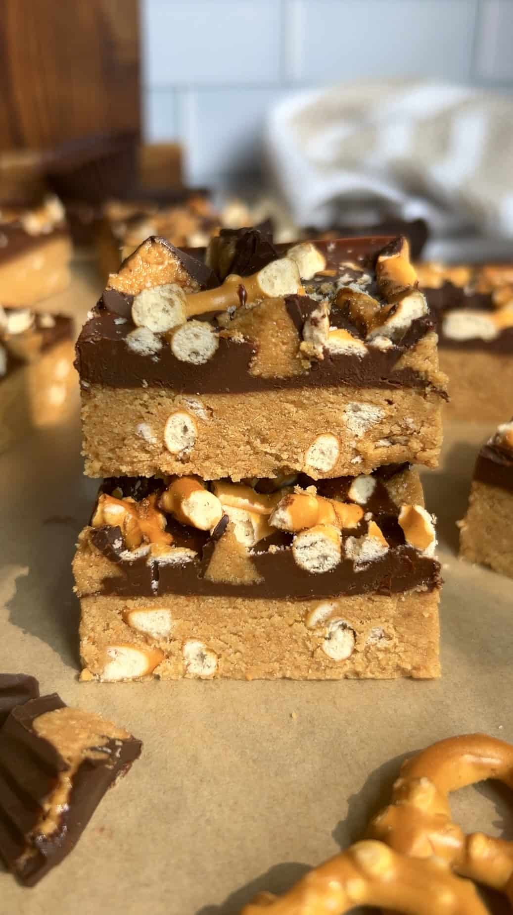 Stacked peanut butter pretzel protein bars showcasing crunchy pretzel details