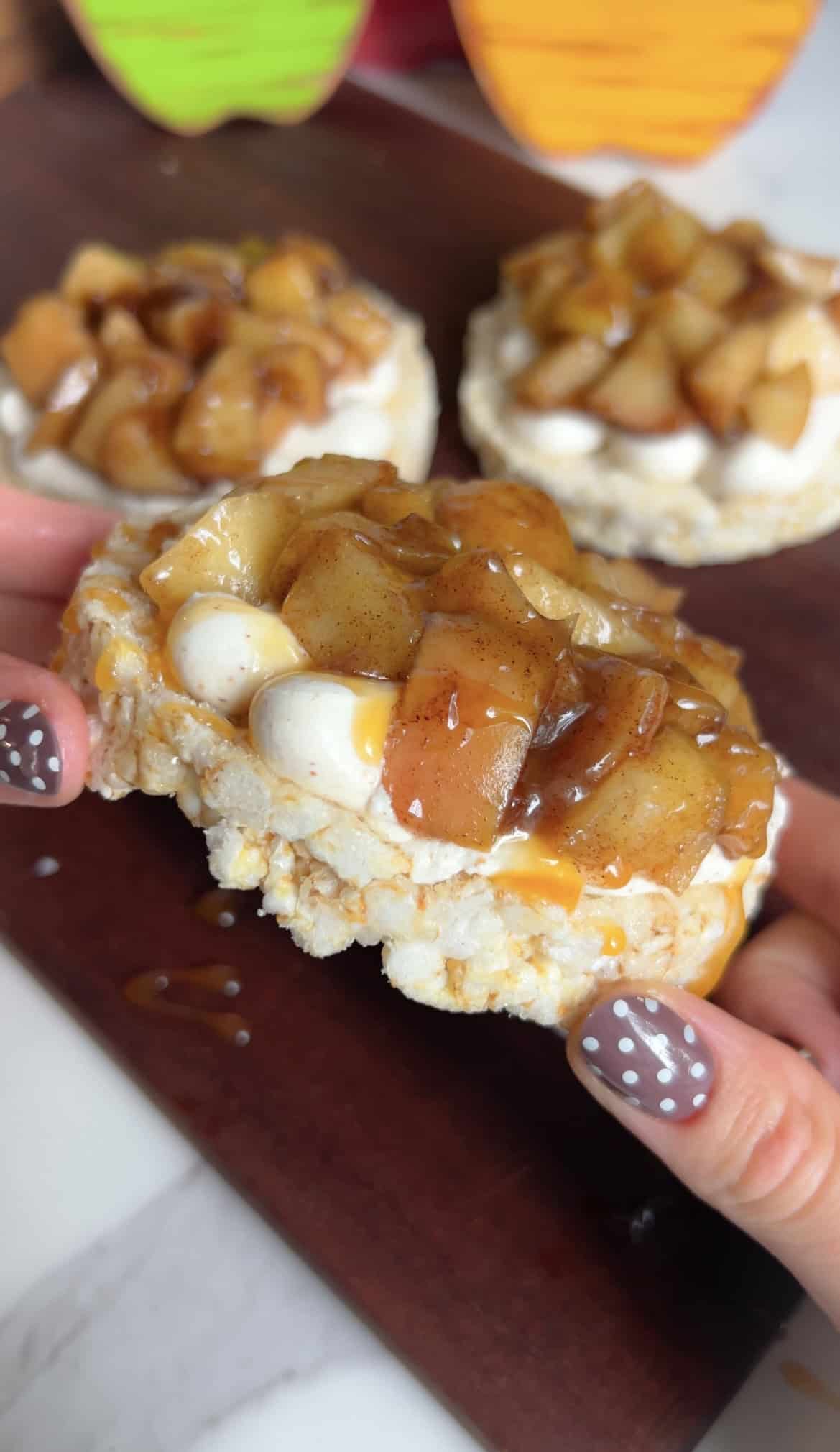 Rice cakes topped with caramelized apple filling and caramel drizzle.